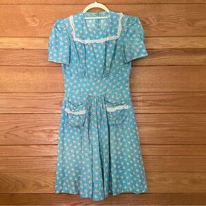 Vintage 1930s feedsack ruffle trim floral dress